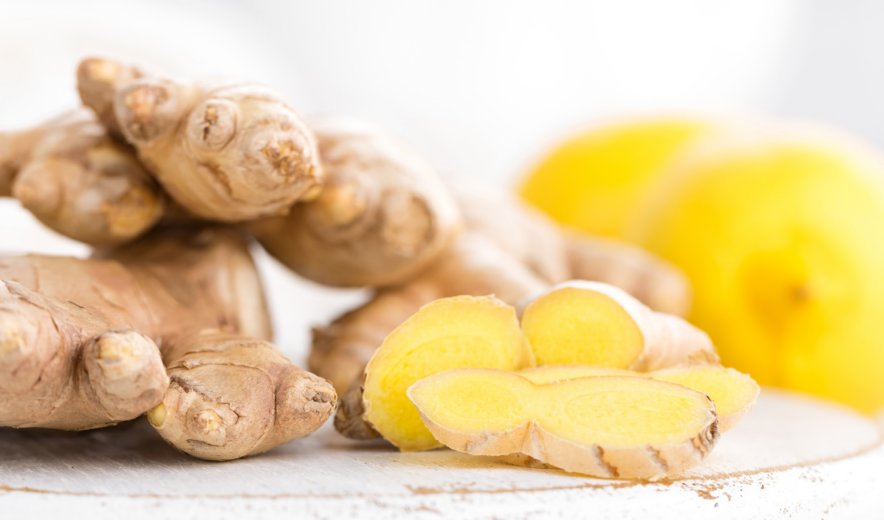 Fresh sliced ginger root and lemon – natural ingredients used in immunity-boosting health shots