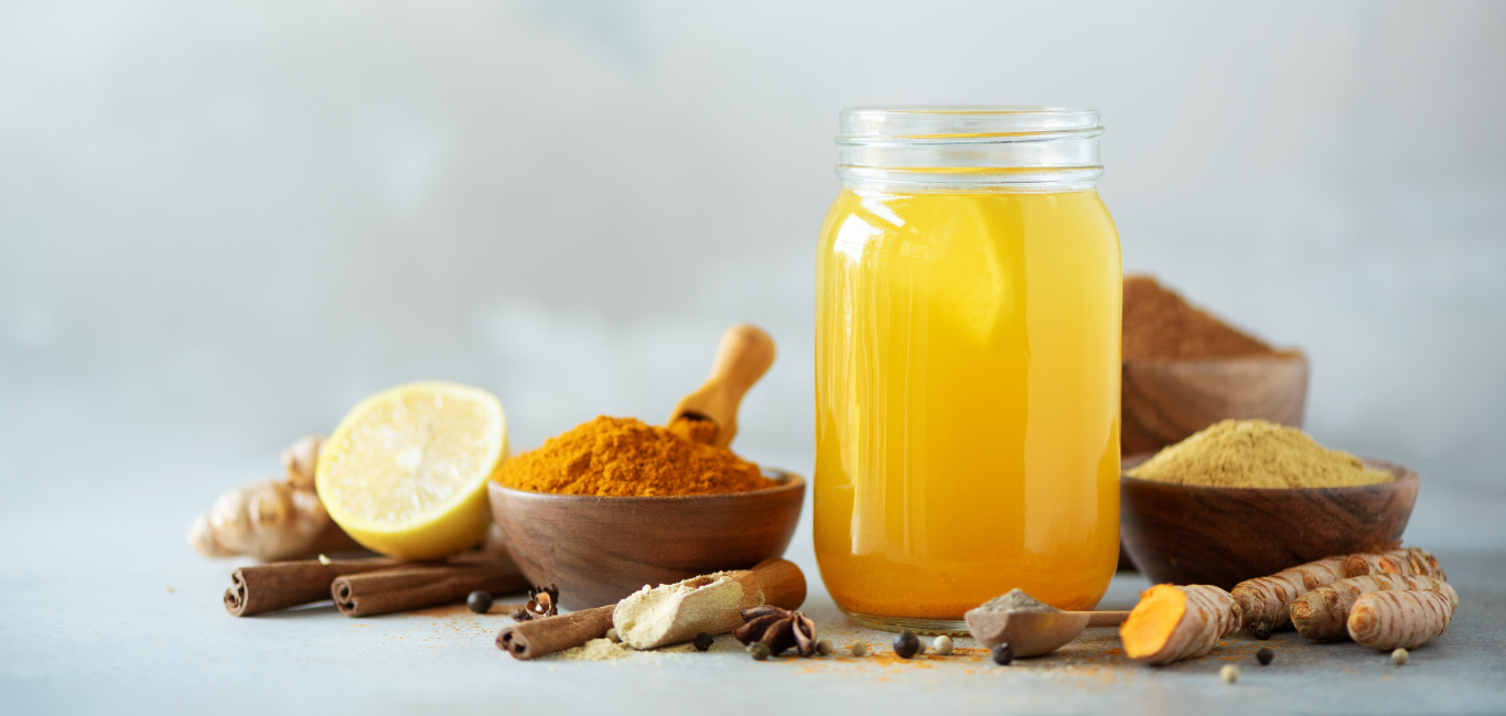 Discover the Best Natural Energy Drinks Natural ginger and turmeric health shot with lemon and spices for immune support